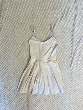 Offline Women’s White Pleated Romper with Spaghetti Straps and shorts w/ pockets